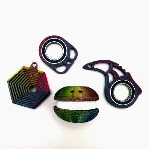 Zestaw prezentowy: 4 gadżety (Keyrambit, Keyspinner, Clicker makaronik, Mini hexagon)